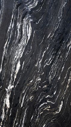 black and white marble textured wallpaper or flooring with streaks of lightening