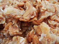 a pile of granola sitting on top of a white plate