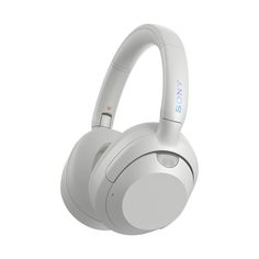 the sony headphones are white and have blue letters on them, while one is attached to