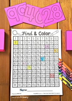 a printable find and color game with crayons on the table next to it