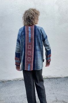 Vintage Blue Embroidered Block Printed Jacket. Stunning vintage top with fabric button closures. Soft lightweight block printed indigo blue cotton with red and brown folk art embroidered panels in front and back and along bottom of sleeves. Delicately hand wash cold. Size L/XL. Fits many. Feels like 100% cotton. Approx. Measurements: Underarm to underarm: 25" Length: 30” Sleeve length: 28” Blue Embroidered Outerwear With Relaxed Fit, Blue Embroidered Relaxed Fit Outerwear, Traditional Blue Relaxed Fit Tops, Traditional Patchwork Cotton Tops, Cotton Relaxed Fit Festival Outerwear, Traditional Blue Long Sleeve Tops, Traditional Long Sleeve Blue Tops, Traditional Indigo Cotton Top, Indigo Cotton Traditional Tops