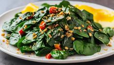 This simple yet delicious spinach sauté is a quick and healthy side dish that pairs well with a wide variety of main courses. Fresh spinach leaves are cooked Meal Sides, Rice Sides, Spinach Casserole, 30 Diet, Vegan Substitutes, Whole 30 Diet, Healthy Side Dish, Fresh Spinach, Spinach Recipes