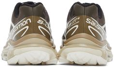 Low-top mesh sneakers in brown and beige. Bonded detailing in tones of brown and white throughout. Round toe. Multicolor textile logo flag at bungee-style lace-up closure. Textile logo flag at tongue. Padded collar. Ortholite® Impressions insole. Logo printed in white at outer heel. Rubberized stripe in beige at welt. Foam rubber midsole in tones of beige. Treaded rubber outsole in off-white. Logo-engraved black hardware. Supplier color: Wren/Kangaroo/Vanilla ice Textile Logo, Mesh Sneakers, Brown And Beige, Vanilla Ice, Black Hardware, Wren, New Balance Sneaker, Brown Beige, Luxury Streetwear