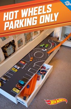 an advertisement for hot wheels parking only on the floor next to a child's bed