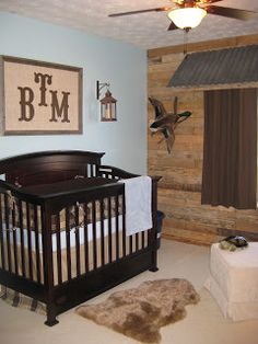 a baby's room decorated in rustic style