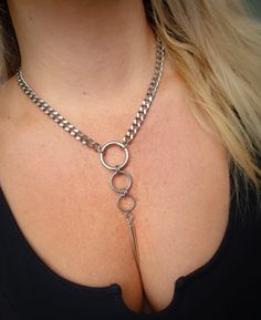 Stunning chunky, edgy multiple O ring and large spike necklace in silver! Chain and o rings are made of stainless steel. Spike pendant is made of zinc alloy and measures Available in 2 sizes: Small: (shown in photographs) Measures 16 inches (up to first O ring) and comes with a 3 inch extension chain. Medium : Measures 18 inches ( up to first O ring) and comes with a 3 inch extension chain. Please don't hesitate to contact me with any queries or suggestions 😊  Comes gift wrapped 💜 Edgy Metal Chain Necklace, Punk Stainless Steel Jewelry With Metal Ring, Punk Style Stainless Steel Metal Ring Jewelry, Edgy Metal Jewelry With Chunky Chain, Punk Metal Chunky Chain Jewelry, Edgy Silver Metal Chain Necklace, Spike Necklace, Ring Der O, Botanical Pattern