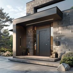 an entrance to a modern home with two doors and steps leading up to the front door