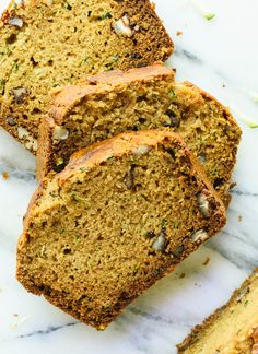 slices of zucchini bread on a marble surface