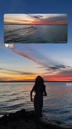 a woman standing on top of a sandy beach next to the ocean at sunset or dawn