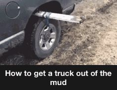 there is a black car that has the words how to get a truck out of the mud