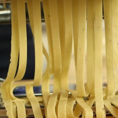 several pieces of pasta sitting on top of a wooden table