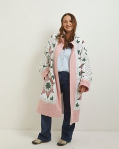 This captivating long wrap coat is more than just an outer layer – it's a statement piece steeped in sustainable style. Crafted from 100% cotton vintage fabric, expertly upcycled and given a new lease on life, this coat boasts a rich history and unique character. The long, wrap silhouette flatters any figure, while the self-tie belt cinches your waist for a defined look. Deep pockets add functionality without compromising the flowy drape. Perfect for those breezy spring days, this coat offers effortless elegance with a touch of vintage charm. Designed for an easy, oversized relaxed fit. Would fit size: 16 - 18 - 20 Measurements : Armpit- armpit 74cm, Nape of neck to bottom hem 106cm, Neck - rolled cuff 65cm Materials: 100% up-cycled vintage quilted patchwork cotton. Trees planted: 37 in yo Patchwork Coat, Quilted Patchwork, Nape Of Neck, Sustainable Style, Wrap Coat, Belt Tying, Effortless Elegance, Spring Day, Cycling Outfit