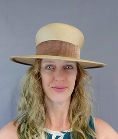 "~Vintage 1960s Boater Hat featuring ... Very finely woven, neutral colored straw Wide mocha velvet ribbon trim Asymmetric brim is 3 1/4\" wide at front and 2 1/2\" wide at back Brown grosgrain sweatband Tag reads: \"French Room, Stix, Baer & Fuller\" Please be aware, this hat sits high on the head and has a relatively tall crown Measurements ... Interior circumference is approximately 21 1/2\" 13\" diameter Crown is 4 1/2\" tall ~Excellent vintage condition ... no holes, tears, or stains ~W French Room, Tall Crown, Straw Boater Hat, 20s Style, Straw Boater, Boater Hat, 20s Fashion, Ribbon Trim, Velvet Ribbon