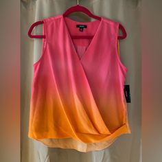 New With Tag From Alfani This Beautiful Women’s “Citrus Sunset” Sleeveless Pullover Top In Size Pm. It Is A Pullover And Is Sleeveless With An Asymmetrical Hem. Trendy Orange Sleeveless Top, Trendy Sleeveless Orange Tops, Chic Sleeveless Orange Top, Chic Orange Sleeveless Top, Orange Vest Top For Spring, Pink V-neck Vest For Summer, Orange Sleeveless Top For Spring, Orange Sleeveless Casual Blouse, Chic Orange Sleeveless Blouse