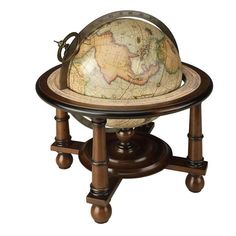 an old world globe sitting on top of a wooden stand with two legs and wheels