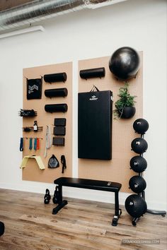 there is a wall with exercise equipment on it