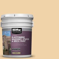 a bucket of paint with the words behr premium on it and an image of a house in the background