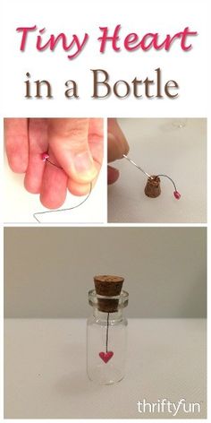 the tiny heart in a bottle is attached to a string