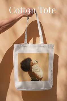 A cotton tote bag with an illustration of a black girl holding her pet dog perfect for that dog person. This is the perfect gift for those with furry friends to run errands in. Find this aesthetic art piece featured on art prints, bags, stickers, notebooks, journals and tshirts in my  shop linked below. Hair Saloon, Cute Pet Dog, Dog Tote Bag, Dog Tote, Saloon Hair, Designer Totes, Hair Dresser, Black Culture