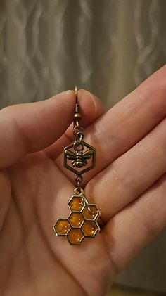 In honor of our "Honey Man" Grandfather, who recently passed on, these bee-themed earrings celebrate his memory. Bottles contain his real, raw honey. Handmade Honey Color Jewelry Gift, Handmade Honey-colored Jewelry For Gifts, Handmade Honey Jewelry For Gift, Honey Bee Earrings, Hood River, Bee Earrings, Bee Theme, Raw Honey, Antique Earrings