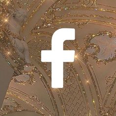 a white facebook logo overlaided with gold glitter