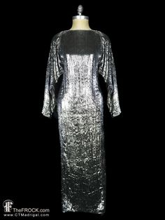 "BIG NEWS After 22 years, our website, TheFROCK.com, has had a makeover. Check out the new site, and join our mailing list for new arrivals.  Dazzling vintage Louis Feraud gown in the most incredible super soft silvery gray textile with a nearly furry pile. Lined. Rear asking slit. Rear invisible zipper. Measures about 34\" at bust, 30\" at waist, hips 37\", length 55.5\", and sleeve length 23.5\". Condition is excellent.  Layaway is available. ALL DELIVERY DATES mentioned by Etsy are ESTIMATES, Gown Long Sleeve, Louis Feraud, Dress Silver, Vintage Fur, Big News, Silver Dress, Mailing List, New Instagram, Invisible Zipper