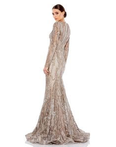 Mac Duggal Embroidered fabric (100% polyester) Fully lined V-Neckline Long Sleeve Back zipper Approx. 62.5" from top of shoulder to bottom hem Available in Taupe Style #79358 Mother Of The Groom Gowns, Dress Elegantly, Horsehair Hem, Sequin Evening Dress, Mnm Couture, Jasz Couture, Intricate Beading, Long Sleeve Evening Gowns, Exquisite Gowns