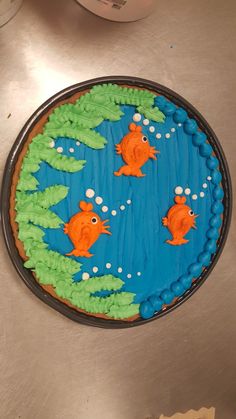 there is a cake that looks like fish in the water