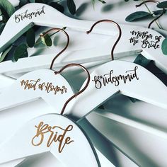 wedding hangers with bride and groom names on them