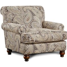 a chair that is sitting in front of a white background with paisley print on it