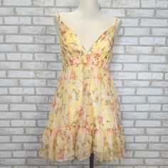 Nwt, New With Tag. No Flaws, But Has Price Stickers On The Care Tag (There Will Be Sticky Residue When Removed). Please See All Photos For Examples Of Condition And Wear. Floral-Printed Spaghetti Strap Babydoll Dress With A Ruched Bodice And Empire Waistband, Deep-V Neckline, Strappy Back, And A Flirty Ruffled Bottom Hem. Beautiful, Lightweight, And Flowy Dress. Ieena For Mac Duggal 100% Polyester Fully Lined Sleeveless Back Zipper Mini Length Approx. Length From Shoulder To Hem: 31" Color: Lemo New Mac, Ruched Bodice, Mac Duggal, Ruffle Mini Dress, Care Tag, Flowy Dress, Babydoll Dress, Floral Printed, Empire Waist