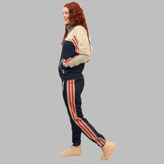 This women 2-piece tracksuit is a great fit for the spring and fall weather in a stylish two color combination outfit with stripes. Tracksuits 2-piece matching sets are a part of everyday life from the GYM the sports field and working from home to daily casual activities. This 2-piece tracksuit (activewear suit) features a seamlessly comfortable track material suitable for any age. The jogger style tracksuit track pants are in line with current fashion trends. About this item 1. Women matching 2 Top And Bottom Outfit, Combination Outfit, Full Tracksuit, Sports Field, Color Combinations For Clothes, Joggers Track Pants, Current Fashion, Tracksuit Set, Current Fashion Trends