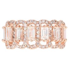 This ring has 7 straight Baguette Cut Diamonds that weigh 1.27 Carats and is embellished with 96 Round Cut Diamonds that weigh 0.70 Carats. The clarity and color of the diamonds are VS-H. Crafted in 14 Karat Rose Gold and weighs approximately 5.5 grams The ring is a size 7 and can be re-sized at no additional charge! Diamond Wedding Bands Stackable, Baguette Diamond Wedding Band, Baguette Diamond Band, Gold For Sale, Colorless Diamond, Baguette Cut Diamond, Diamond Rings Bands, White Gold Band, Baguette Cut