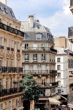 an old building with balconies on the roof