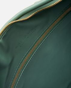 100% Lamb leather Luxury Leather Crossbody Backpack, Luxury Soft Leather Crossbody Backpack, Green Luxury Shoulder Bag With Zipper Closure, Luxury Leather Backpack With Removable Pouch, Luxury Soft Leather Backpack, Calf Leather Travel Shoulder Bag In Pouch Shape, Luxury Leather Backpack With Removable Pouch And Top Handle, Luxury Green Satchel With Soft Leather, Luxury Green Soft Leather Satchel