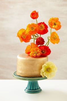 an image of a cake with flowers on top