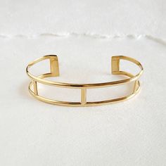 Palm Cuff ..Simple solid brass adjustable, matching bangle cuff and collar also available Handcrafted Solid Brass Adjustable Open Cuff Gold Jewelry, Modern Adjustable Open Cuff Bracelet, Classic Brass Bangle Cuff Bracelet, Gold Open Band Cuff Bracelet Minimalist Style, Gold Minimalist Open Band Cuff Bracelet, Classic Adjustable Open Cuff Bangle, Adjustable Minimalist Metal Cuff Bracelet, Modern Adjustable Cuff Bracelet With Open Band, Modern Adjustable Open Band Cuff Bracelet