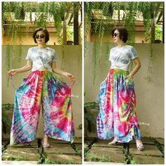 "Boho funky steampunk tie dye wide leg cotton pants. The pants feature beautiful tie dye color, 2 roomy pockets and adjustable side ruched ties that create a variety of lengths and looks! Material: 100% cotton (stretchable)  Model is 161 cm. tall with 28\" waist and 38\" hip(wearing 3\" high heel shoes) Weight: 519g  Status: ready to ship Measurement: pants (approximately) Elastic waist: 30\"-52\"  Hip: 68\" can fit up to hip max 62\" Length: 37\"- 39\" (from waist to hem after drawn) - Color va Hippie Style Tie-dye Pants For Festival, Wide Leg Cotton Pants, Tie Dye Harem Pants, Casual Hand-dyed Tie-dye Bottoms, Spring Hippie Tie-dye Pants, Tie-dye Hippie Harem Pants For Festivals, Festival Tie-dye Hand Dyed Bottoms, Pants Boho, Boho Tie Dye