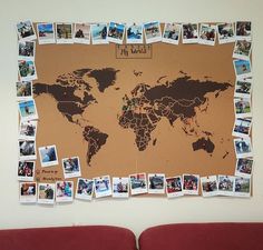 a bulletin board with pictures on it that is covered in photos and pinned to the wall