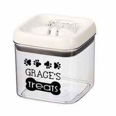 a dog treat box with the words grace's treats in black and white on it