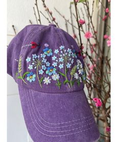 Hand Embroidery Wild Flower Hat, Daisy Embroidered Baseball Cap, Embroidered Flower Hat, Embroidered Denim Cap,Hat For Women, Women Summer Hat, Gift for Her, Gift for Mom, Birthday Gift. 📍Product name: Hand embroidered flower hat Design: hand embroidered with pansi flower, lady busg. Cap size (head circumference): 55 - 60 cm; Fabric: 100% cotton  📍Products are hand-embroidered entirely from Vietnamese craftsmen. Each stitch is meticulously embroidered, the colors are harmonious. Please store t Spring Embroidered Baseball Cap, Spring Purple Snapback Baseball Cap, Purple Snapback Baseball Cap For Spring, Spring Embroidered Baseball Cap Trucker Hat, Embroidered Trucker Hat For Spring, Embroidered Baseball Cap Trucker Hat For Spring, Purple Baseball Cap For Spring, One Size Fits Most, Purple Baseball Cap For Spring, Spring Purple Baseball Cap