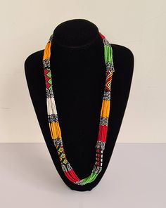 This necklace is 100% handcrafted using colorful fine beads. **Listing is for 2 necklaces like shown above. They make a perfect gift to loved ones. Dimensions; 32 inches. **Buy multiple items and pay shipping for 1 item only.The rest ships free. Custom orders are welcome. More neckleces here; https://www.etsy.com/shop/TribalTess?ref=seller-platform-mcnav&section_id=21306083 Back to my shop; https://www.etsy.com/shop/TribalTess?ref=seller-platform-mcnav Unique Multicolor Small Beads, Adjustable Long Multicolor Necklace, Long Beaded Necklaces For Festivals, Festival Gift Long Beaded Necklaces, Festival Gift Long Beaded Necklace, Festive Long Beaded Necklace Gift, Traditional Multicolor Beaded Necklaces As Gift, Adjustable Multicolor Beaded Necklace For Festive Occasions, Adjustable Multicolor Beaded Necklace For Festivities