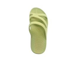 a pair of green slippers on a white background, with the bottom part visible