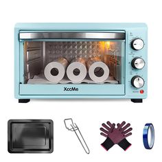 a blue toaster oven sitting on top of a counter next to some kitchen accessories