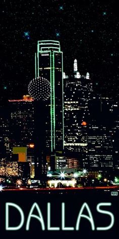 the words dallas are lit up in front of a night time cityscape with skyscrapers