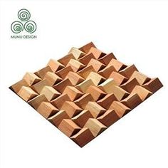 wooden blocks are stacked on top of each other to form a pyramid shape pattern, with the words mamu design above them