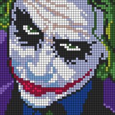 a cross stitch pattern of the joker from dc comics, with green eyes and red nose