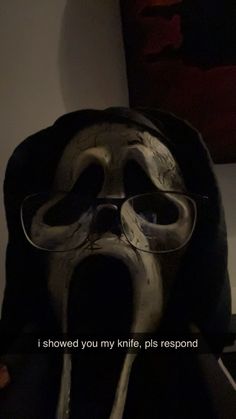 a creepy mask with the words i showed you my knife, piss respond