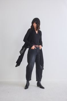 This timeless and versatile cardigan is the perfect layering piece. You can easily dress her up and down for effortless elegant lounging, power meetings and anything in between. Relaxed, drapey fit Long sleeves, fitted in the arms Hits at the knee Tapered hemline Stretchy fabric Versatile V-neck Cardigan For Layering, Versatile V-neck Cardigan For Daywear, Versatile Long Sleeve Fine Knit Cardigan, Fine Knit V-neck Outerwear For Layering, Chic Long Sleeve Cardigan For Layering, V-neck Fine Knit Outerwear For Layering, Versatile Fine Knit Cardigan For Work, Chic V-neck Cardigan For Layering, Versatile Fine Knit Cardigan For Fall