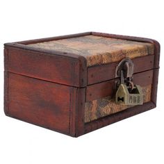 an old wooden box with a lock on it